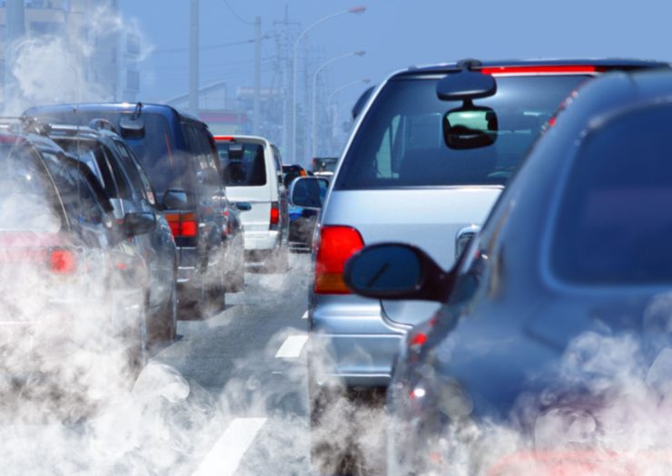 traffic jam exhaust a traffic jam of cars and their exhaust stresses a bicycling benefit of reduced carbon emissions