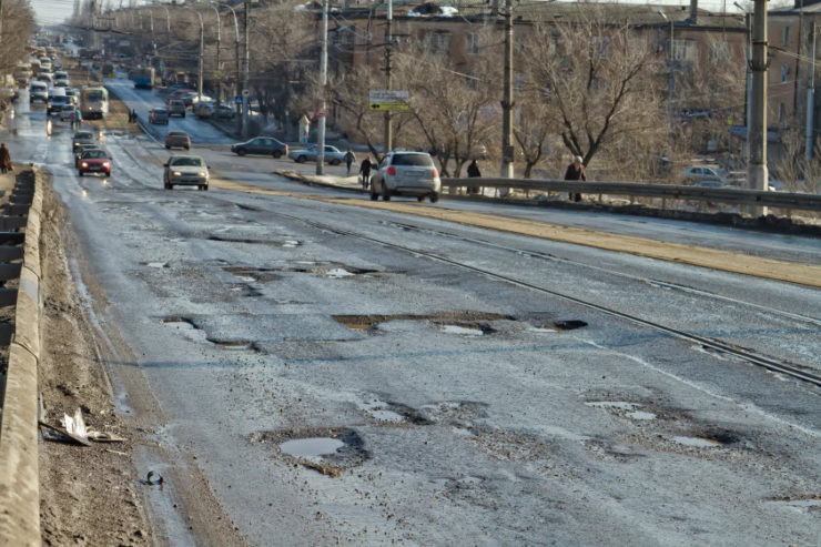 worn down non-biking road a worn down road stress the bicycling benefits of less wear and tear