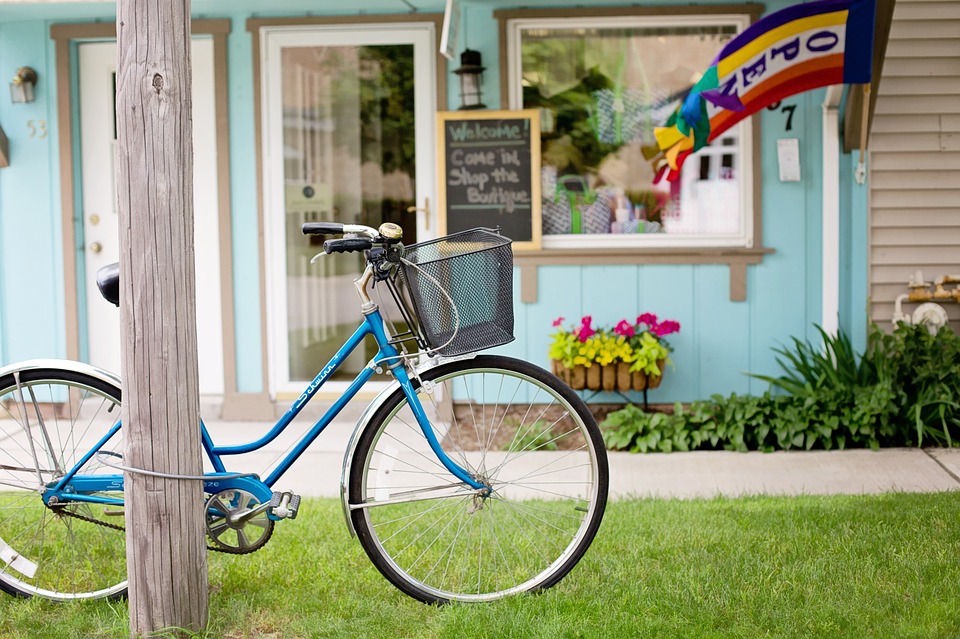 blue vintage beach cruiser with bell
