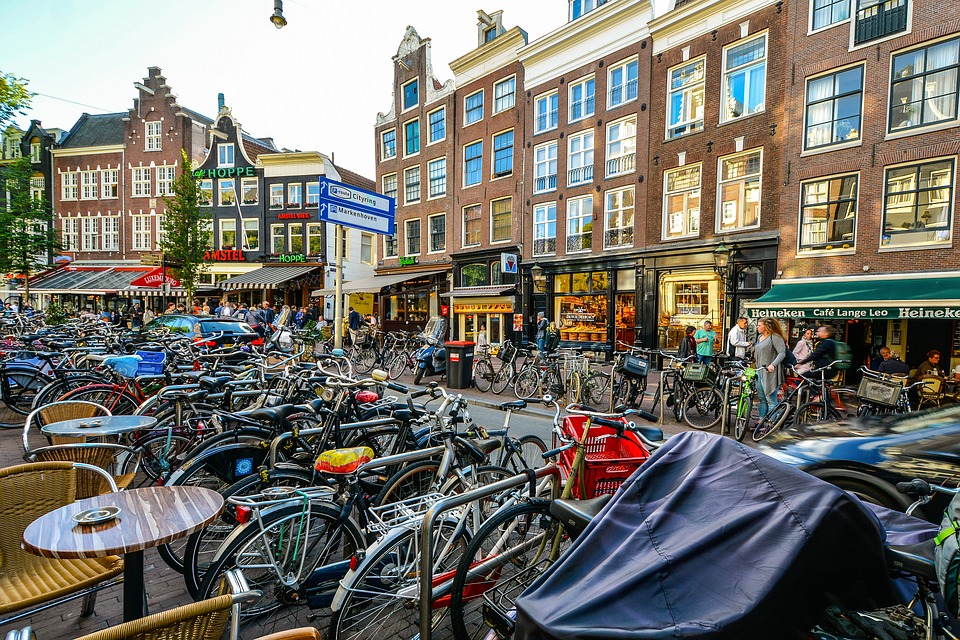 amsterdam bikes in a cafe square